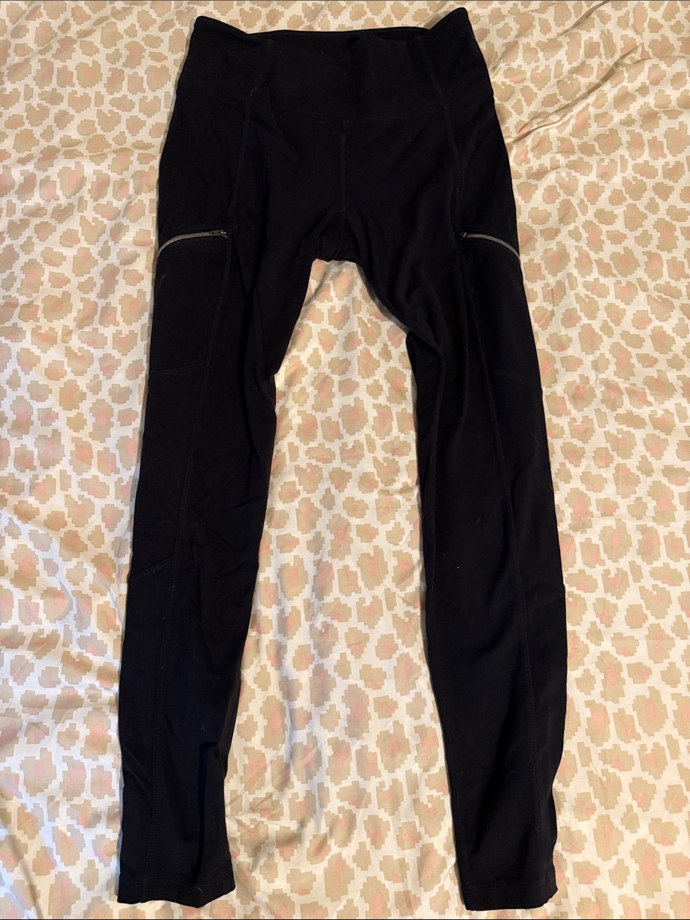 Athleta Black High-Rise Leggings with Zippered Side Pockets